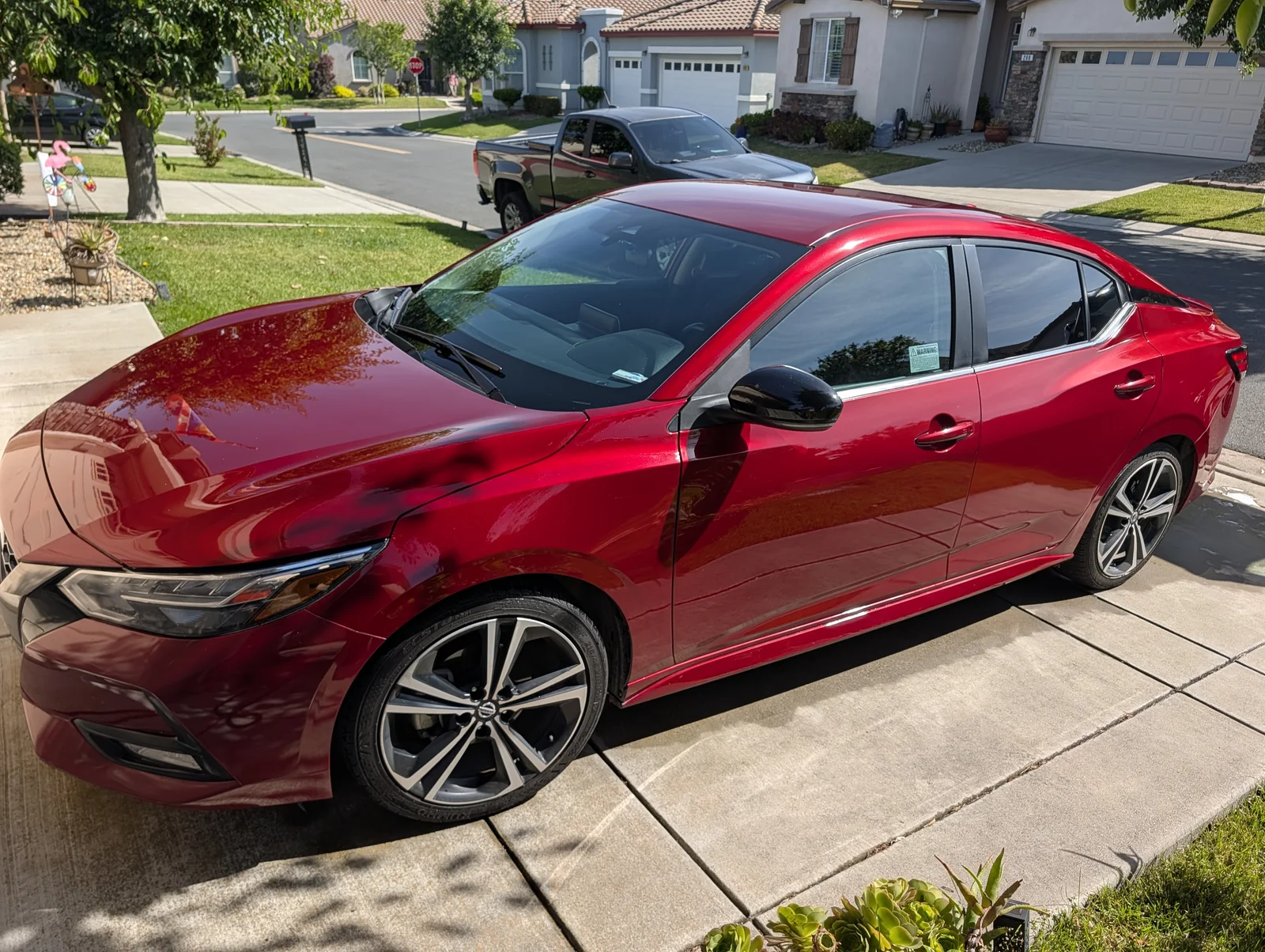 Nissan Sentry after express wash by Pride Auto Wash
